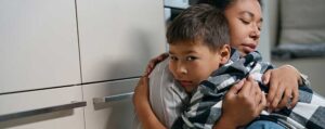 PANS PANDAS child being comforted by parent
